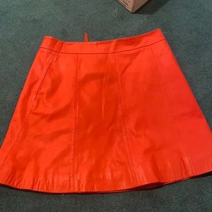 Orange leather skirt